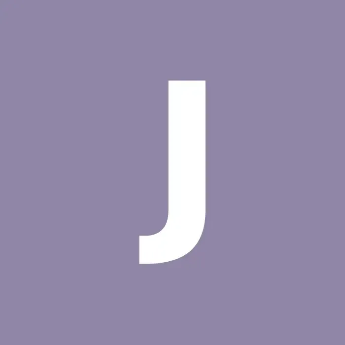 Bold white letter J on a square purple background tile.